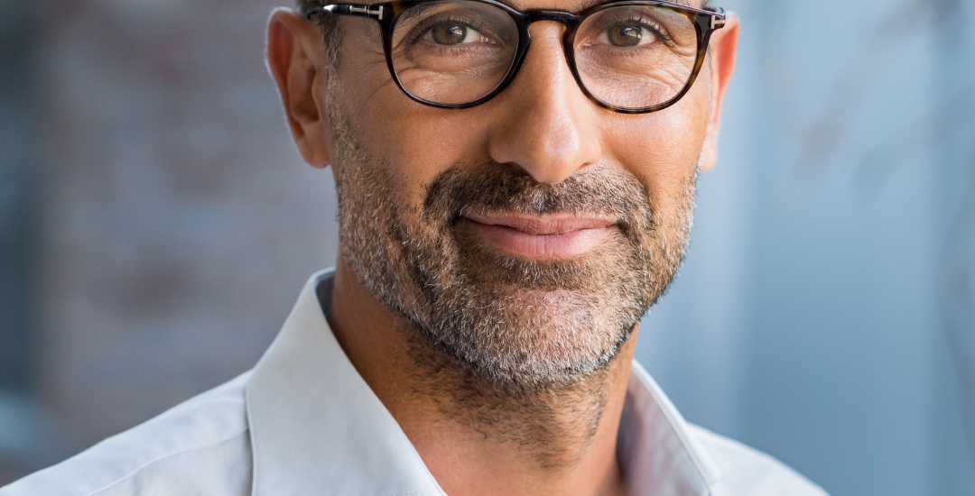 profile image of a man wearing glasses