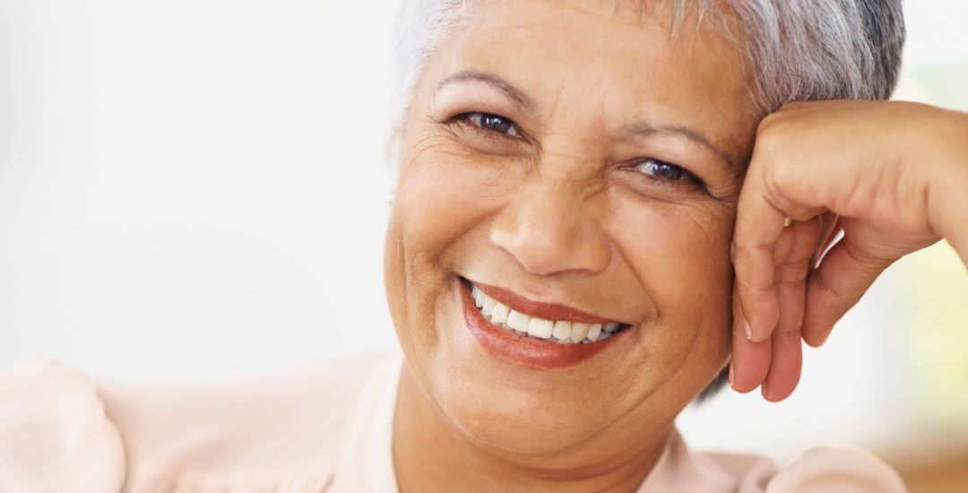 close up image of an old woman with grey hair