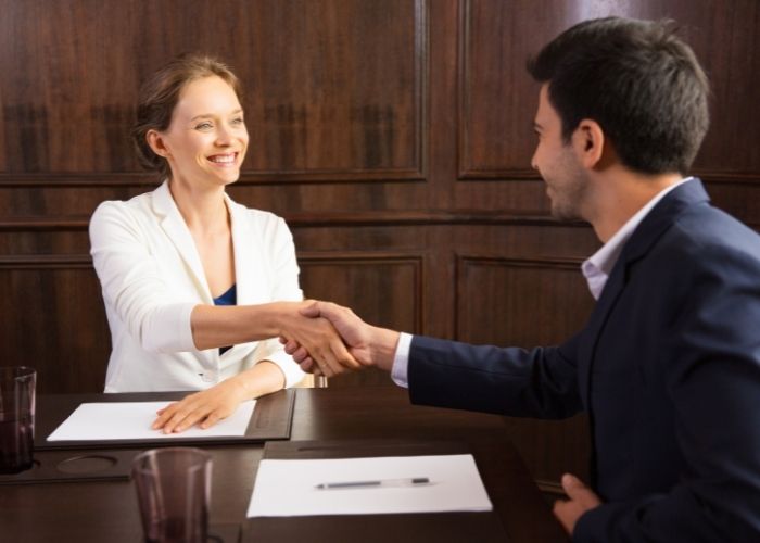 solicitor shaking hands with a client